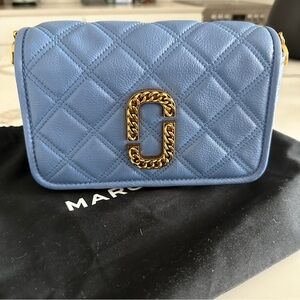The Marc Jacob’s Quilted Medallion Crossbody Bag EUC